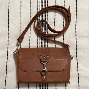 Saddleback Leather Company crossbody purse.